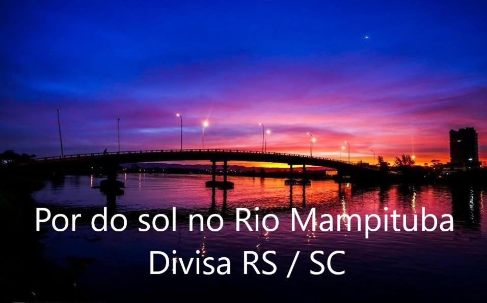 CASA completa em TORRES-RS - O MELHOR CUSTO BENEFICIO na mais bela praia Gaúcha - Cozinha - Banheiro - Ar condicionado - Smart TV 32 Android Apps Youtube - Netflix - Prime Vídeo e Wi-Fi - Estacionamento - Acomoda até 10 pessoas - Anfitriã Superhost n Villa Exterior foto